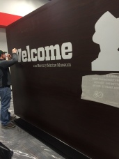 Flyway Team installing the "Welcome Wall" graphics